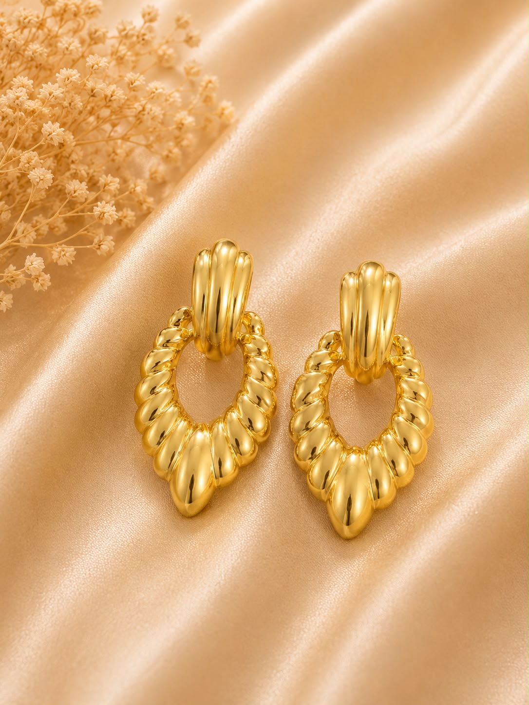 Golden Twisted Oval Drop Earrings